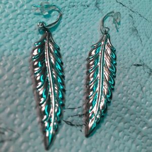 2 inch pure silver feather earrings.